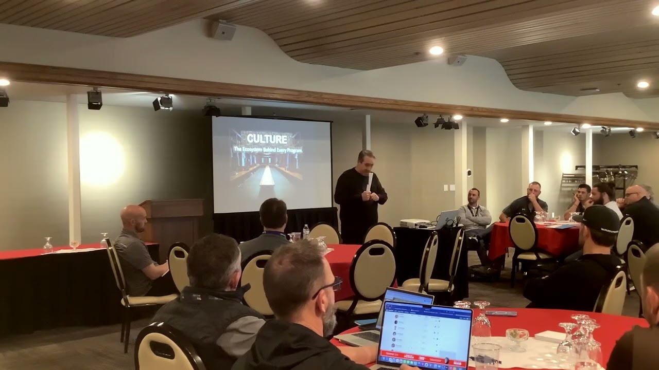 Matt Harr speaking about school culture to athletic administrators at a conference