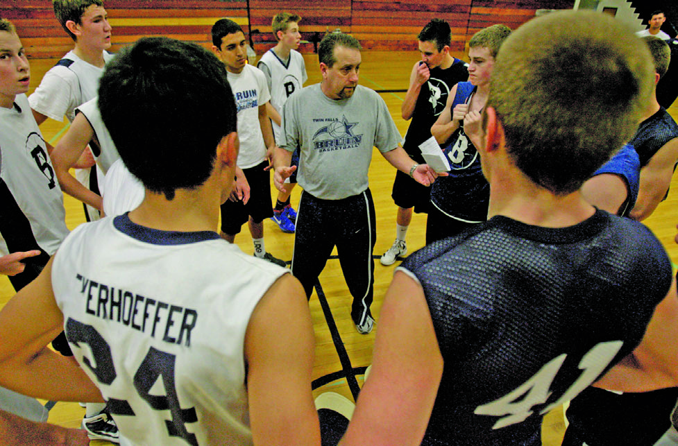 Matt Harr talking to the Twin Falls boys basketball team during practice in 2012